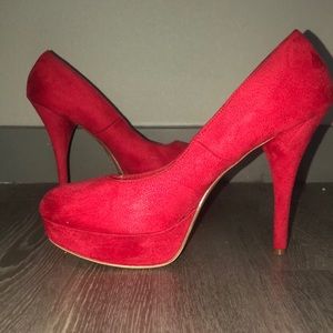 Brash red stiletto pumps